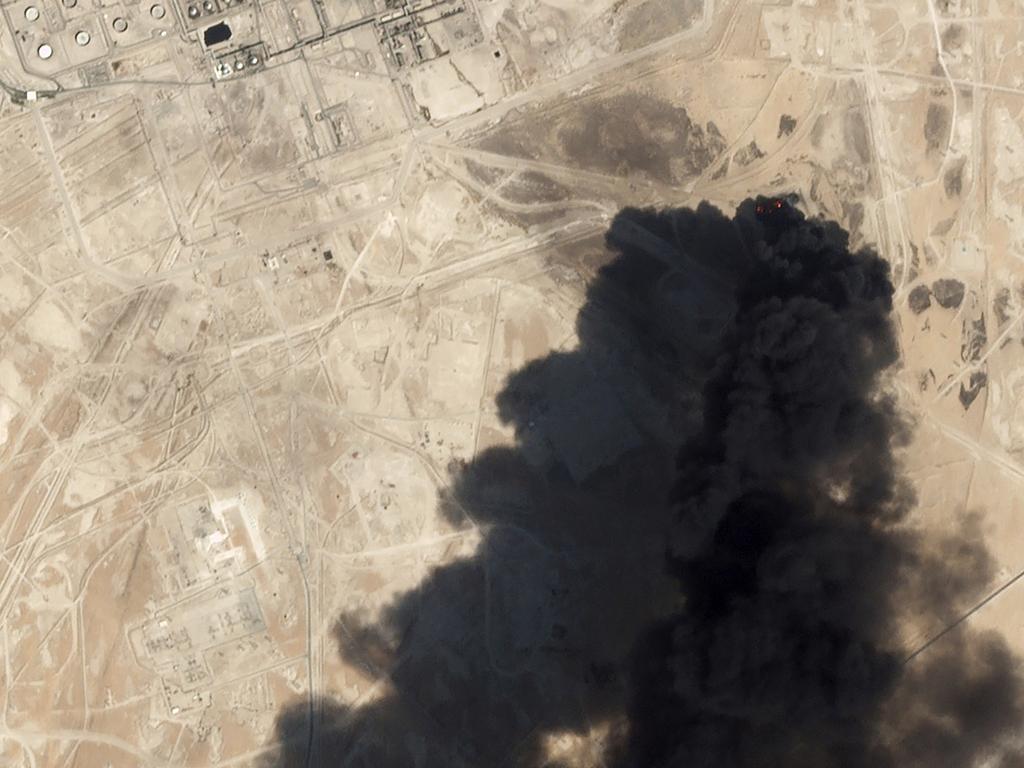 Satellite image shows thick black smoke rising from Saudi Aramco's Abqaiq oil processing facility in Buqyaq, Saudi Arabia. Picture: Planet Labs Inc via AP