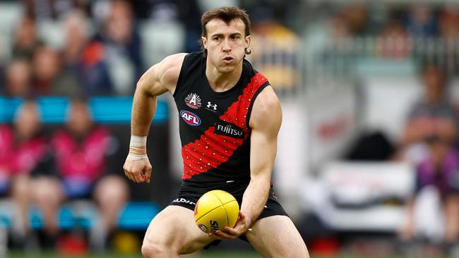 MELBOURNE, AUSTRALIA - APRIL 25: Andrew McGrath of the Bombers in action during the 2024 AFL Round 07 match between the Essendon Bombers and the Collingwood Magpies at the Melbourne Cricket Ground on April 25, 2024 in Melbourne, Australia. (Photo by Michael Willson/AFL Photos via Getty Images)