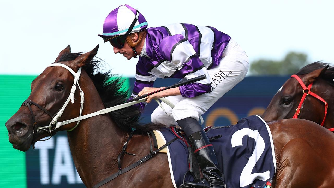 Riff Rocket and Nash Rawiller charge home to win the Group 1 Rosehill Guineas. Picture: Getty Images