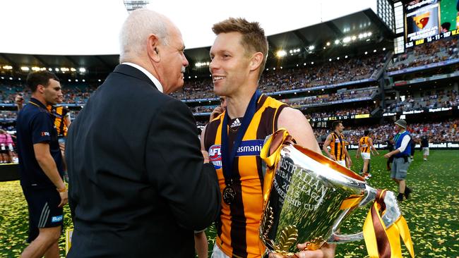 Leigh Matthews and Sam Mitchell after the 2015 grand final. Picture: Colleen Petch