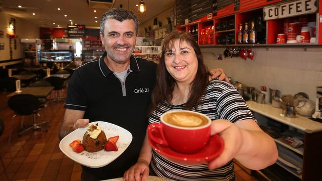 Husband and wife team Suzie and Mario Angelovski both work seven days and 70 hours a week running Cafe 21 in Templestowe Lower. Picture Yuri Kouzmin