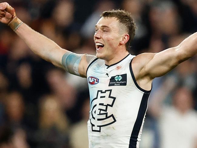 MELBOURNE, AUSTRALIA - SEPTEMBER 15: Patrick Cripps of the Blues celebrates as the final siren sounds during the 2023 AFL First Semi Final match between the Melbourne Demons and the Carlton Blues at Melbourne Cricket Ground on September 15, 2023 in Melbourne, Australia. (Photo by Michael Willson/AFL Photos via Getty Images)