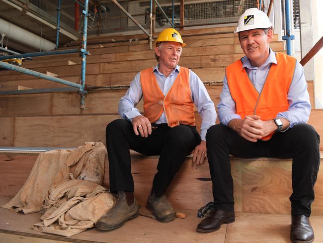                         <s1>Sunbuild managing director Neil Sunners and Chief Minister Michael Gunner at Darwin High School on Monday. </s1>Picture: Keri Megelus