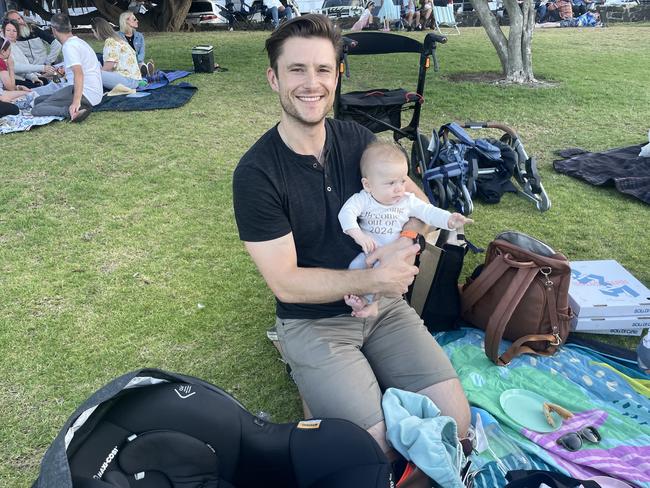 Finn and Sam Jones at Cowes Foreshore on Phillip Island for the 2024 New Year's Eve fireworks. Picture: Jack Colantuono