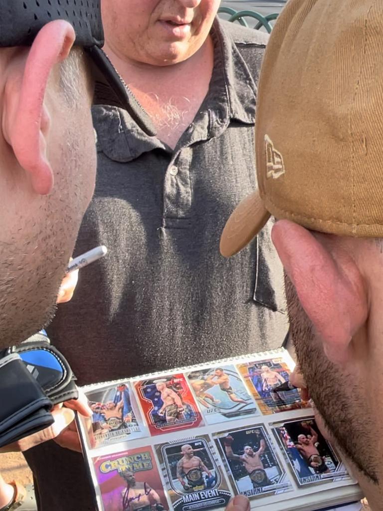 Volkanovski signs memorabilia for a punter in Las Vegas. Picture: Brendan Bradford