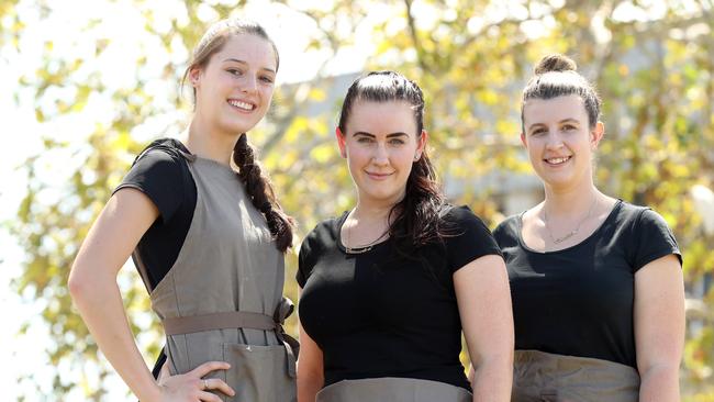 Emily Kowal, Cassandra Ratcliff and Chelsea Ratcliff, workers at St Mary's cafe Cassandra's on the Park, are pleased that a new rail line has been announced for the area. Picture: David Swift