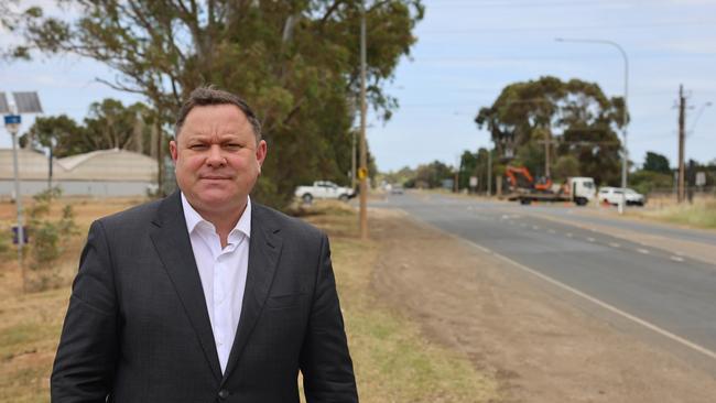 Federal MP for Spence Matt Burnell at the Curtis Road and Heaslip Road intersection where a $30m federal and state grant has been awarded to fix the notorious intersection.