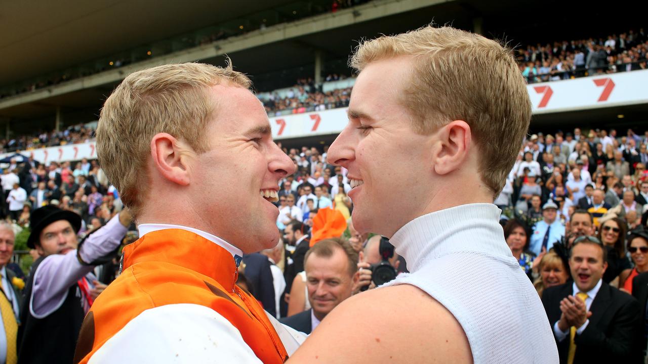 Golden Slipper race day at Rosehill Gardens. Race 7 The Golden Slipper, winner Overreach ridden by Tommy Berry. Tommy hugs twin brother Nathan after the race.