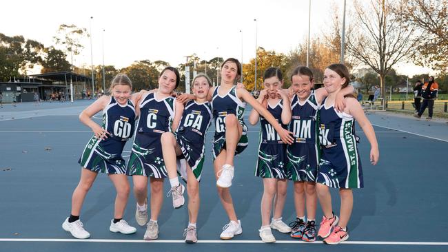 St Mary’s Peck under-11 netball team pull their funniest faces.