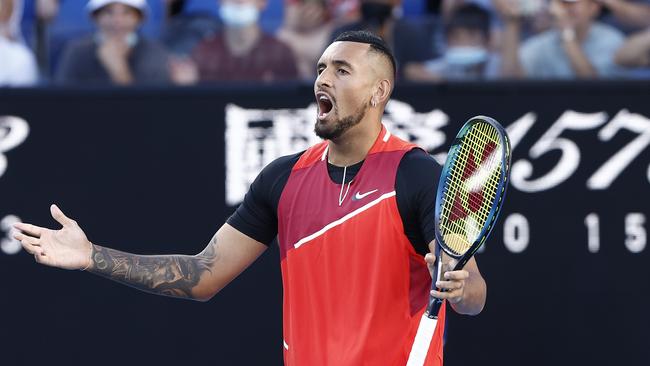 MELBOURNE, AUSTRALIA - JANUARY 21: Nick Kyrgios of Australia reacts in his second round doubles match against Nikola Mektic of Croatia and Mate Pavic of Croatia during day five of the 2022 Australian Open at Melbourne Park on January 21, 2022 in Melbourne, Australia. (Photo by Darrian Traynor/Getty Images)