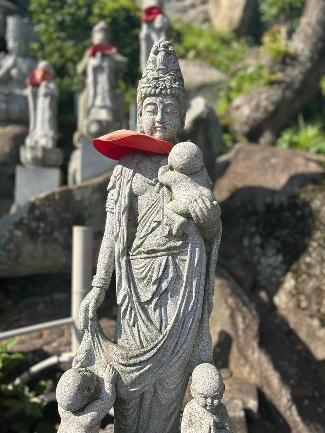 Buddhist statue honouring babies lost in childbirth, Onomichi. Picture: Penny Hunter