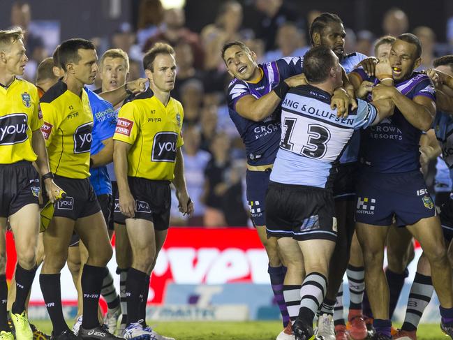 William Chambers of the Storm and Paul Gallen of the Sharks rumble at the end of the Round 4 NRL match between the Cronulla-Sutherland Sharks and the Melbourne Storm at Southern Cross Group Stadium in Sydney, Friday, March 30, 2018. (AAP Image/Craig Golding) NO ARCHIVING, EDITORIAL USE ONLY