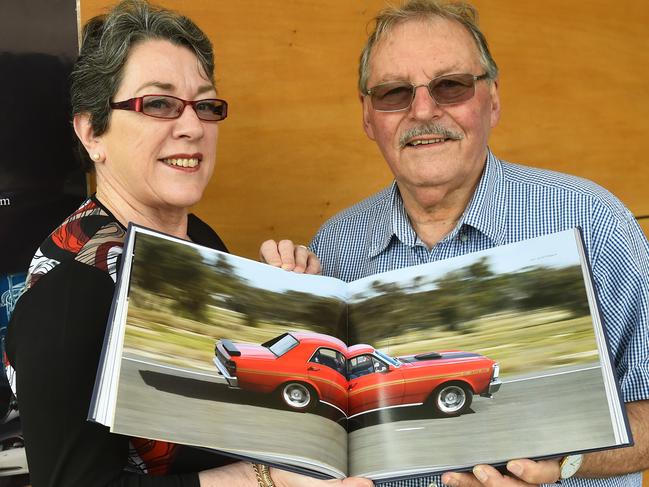 Authors Michele Cook and Doug Wallace with their book about the history of Ford manufacturing in Australia.