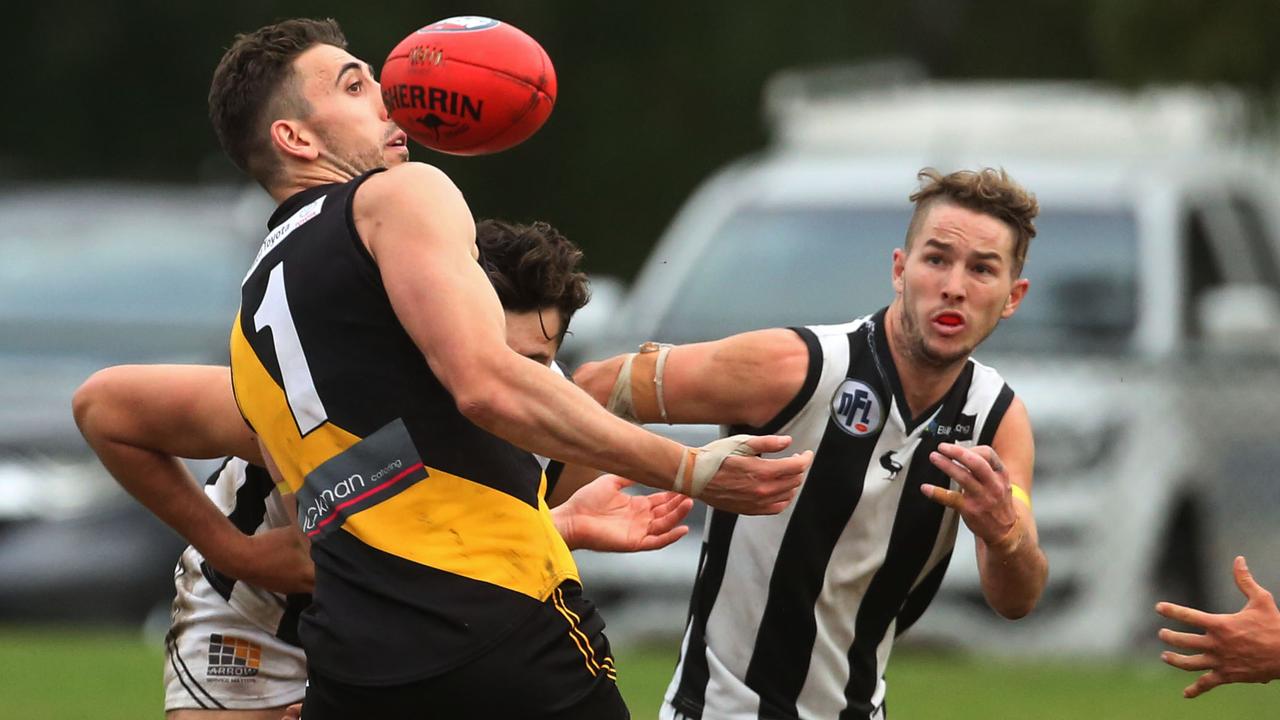 Sam Gilmore keeps his eye on the ball. Picture: Stuart Milligan