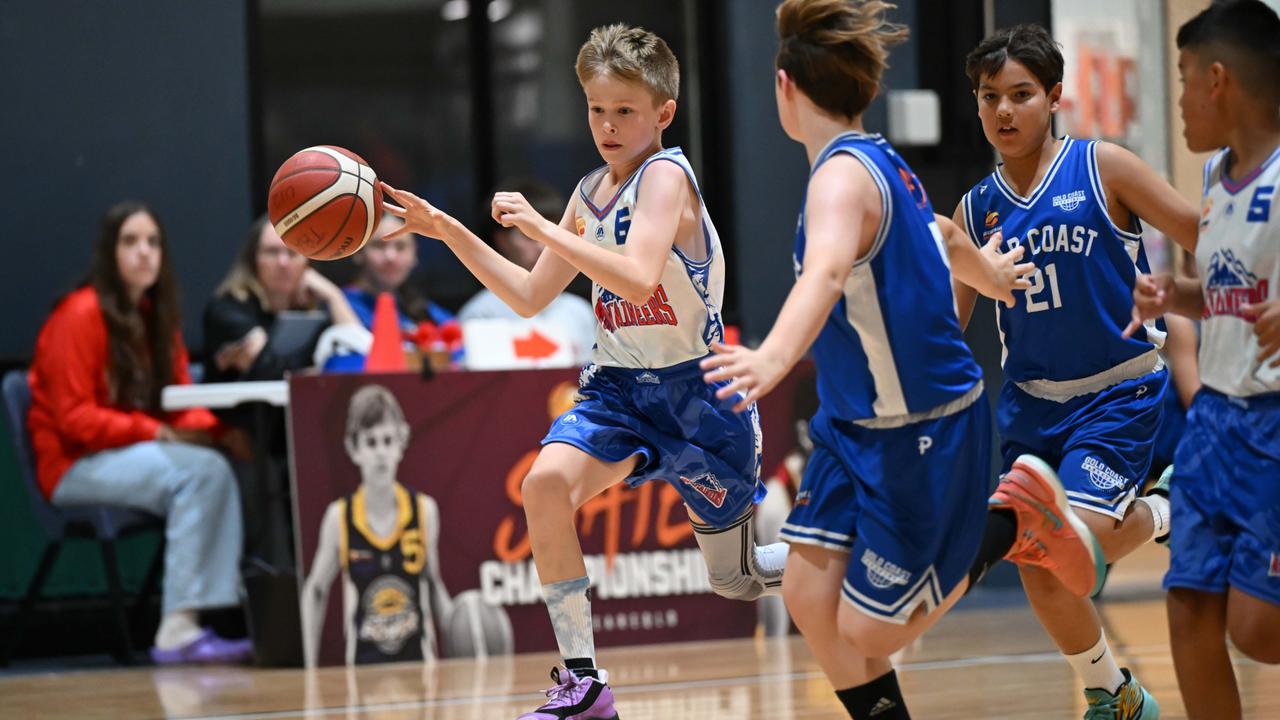 Under 12 State titles action between Toowoomba Mountaineers and Gold Coast. Picture: Basketball Queensland.