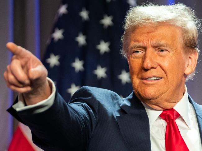 TOPSHOT - US President-elect Donald Trump gestures while speaking during a meeting with House Republicans at the Hyatt Regency hotel in Washington, DC on November 13, 2024. (Photo by Allison ROBBERT / POOL / AFP)