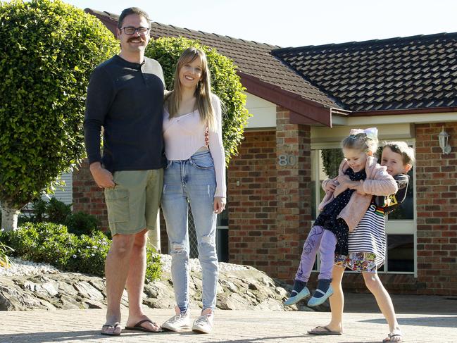 Tim and Samantha Randall with their children Michael (7) and Isabelle (4). Picture: John Appleyard