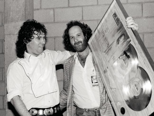 Jimmy Barnes with Michael Gudinski at the Double Platinum Record Presentation for the album For The Working Class Man. Picture: Supplied/ Bob King