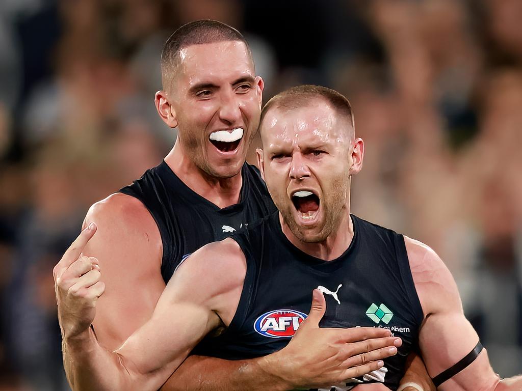 Sam Docherty celebrates a goal with Jacob Weitering. (Photo by Dylan Burns/AFL Photos via Getty Images)