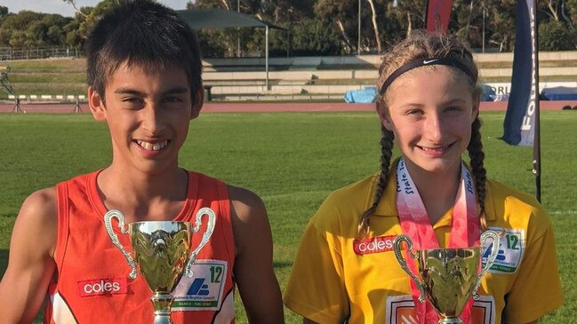 Ken Ferrante Tanikawa (left) with Iluka-Rose Taylor. He won gold and set a new state record in the All Schools. Picture: Woodville Little Athletics