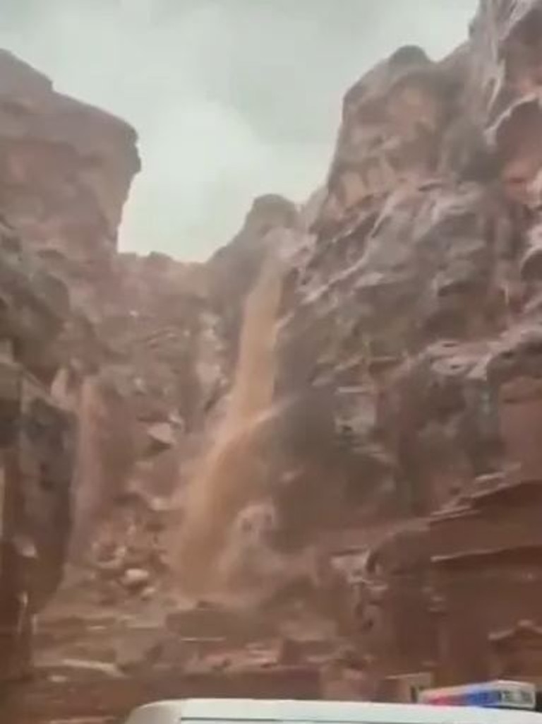 Water suddenly poured over the edge of the mountain.