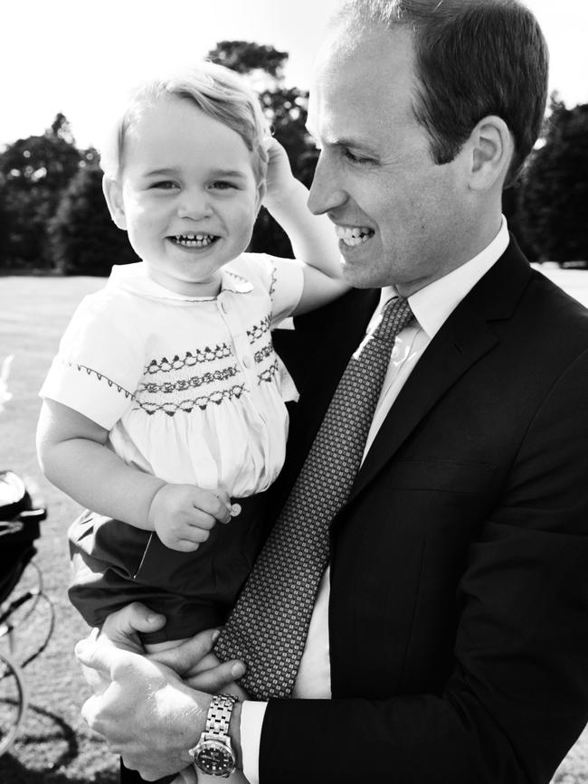 Prince William, Duke of Cambridge and his son Prince George of Cambridge pose for a photo after the christening of Princess Charlotte of Cambridge at the Sandringham Estate on July 5, 2015 in King’s Lynn, England. Picture: Mario Testino/AP