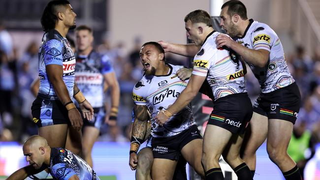 James Fisher-Harris of the Panthers celebrates with teammates after scoring a try. (Photo by Brendon Thorne/Getty Images)