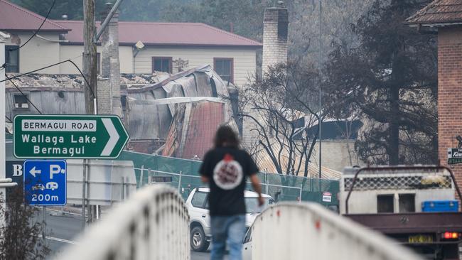 The remains of burnt-out businesses, in close proximity to unaffected buildings in Cobargo. Picture: AAP