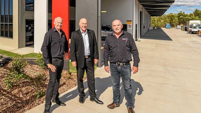 NEW HORIZONS: CBRE's Glen Grimish, centre, with OSJ general manager Pat Meyer and OSJ co-owner Graham Taylor at 39-41 Claude Boyd Pde, Bells Creek. Picture: AEE Jack Gore