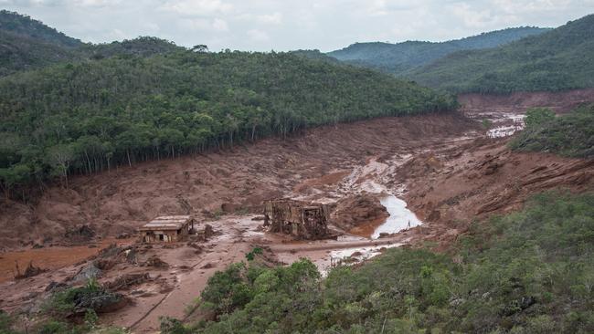 Aerial view of the damage caused by the bursting of the tailings to the village of Bento Rodrigues, in Mariana, Minas Gerais state, Brazil. (AFP PHOTO/CHRISTOPHE SIMON)