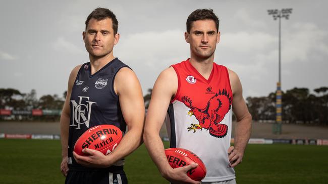 Noarlunga’s Tom Caudle with Flagstaff Hill champion David Kearsley. Picture: Brad Fleet