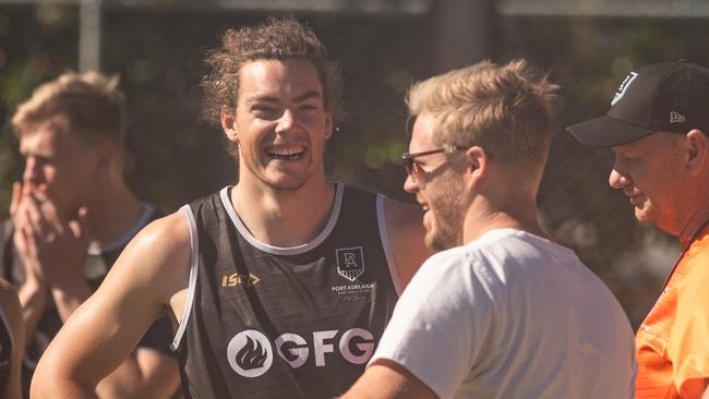 Port Adelaide football club training at Grange Oval. Wylie Buzza talks to coach Ken Hinkley. Picture: Brad Fleet