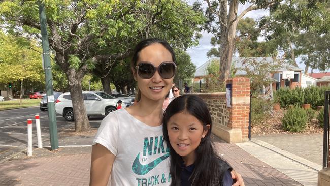 Poi Leung, Norwood West voter, with daughter Sarah. Picture: Brinley Duggan