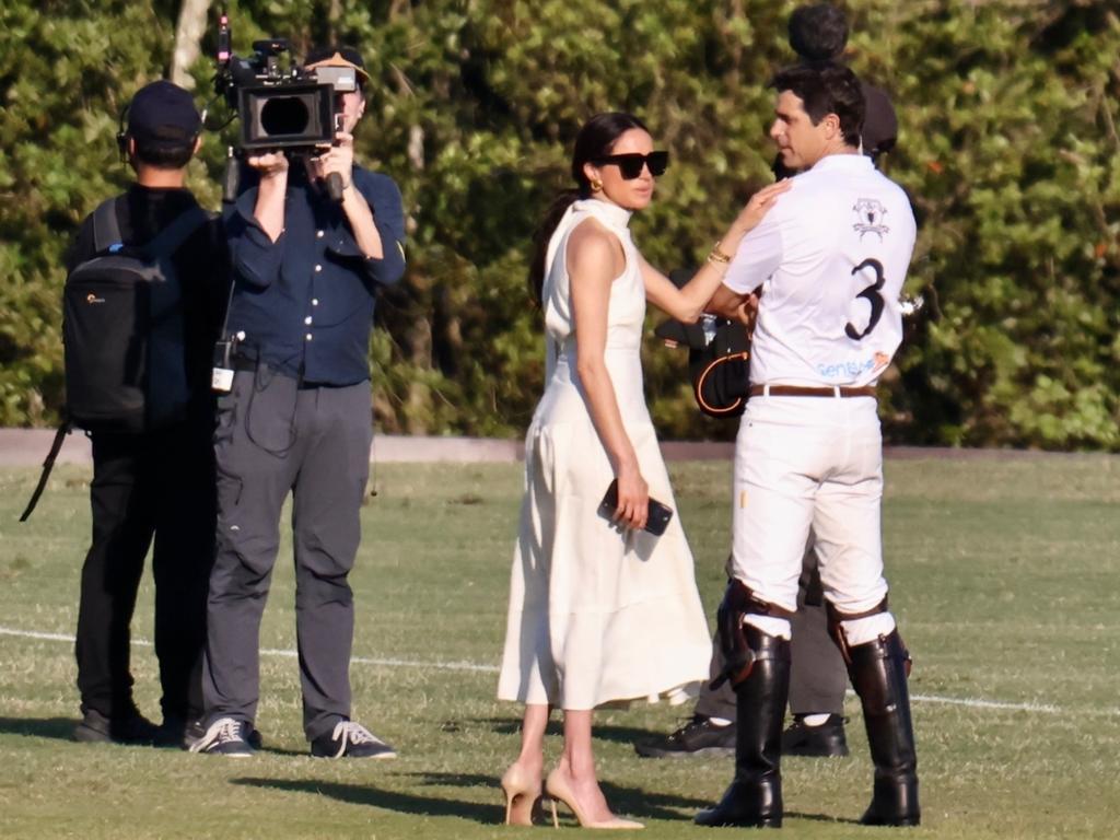 Meghan Markle with Nacho Figueras surrounded by a film crew from Duke's new Netflix show about the elitist sport of polo. Picture: VEM/Miamipixx / BACKGRID