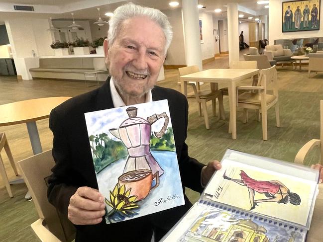 St Basil’s longest-term resident, Father Milton Chryssavgis, shows off his art therapy paintings. Picture: Madeleine Damo