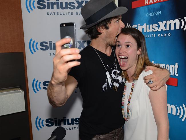 Ian Somerhalder and Julia Cunningham take a selfie photograph after being interviewed on SiriusXM’s Entertainment Weekly Radio channel from Comic-Con 2014. Picture: Getty