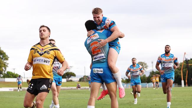 Pride's Will Partridge celebrates with Robert Derby after he scores a try in the Hostplus Cup Queensland Rugby League (QRL) match between the Northern Pride and the Sunshine Coast Falcons, held at Barlow Park, Cairns Picture: Brendan Radke