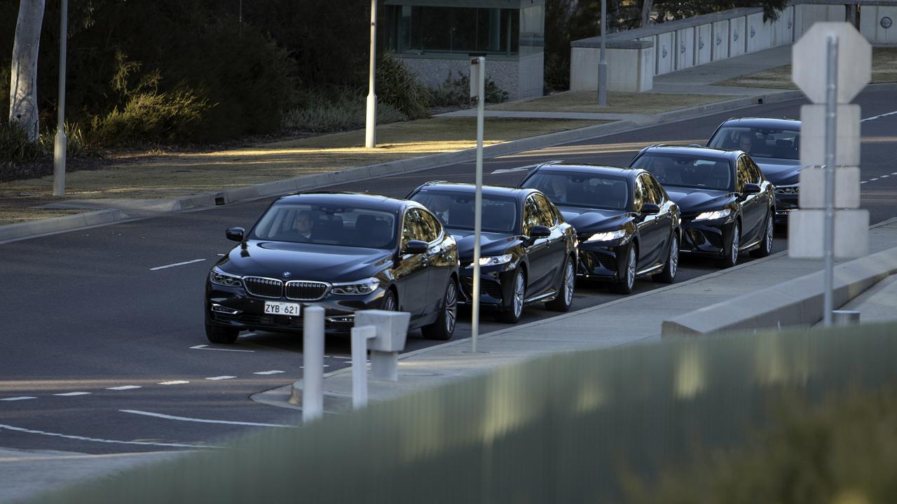 BMWs which are part of the parliamentary COMCAR fleet wait outside Parliament House. Picture: NCA NewsWire