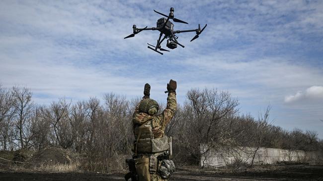 A Ukrainian serviceman flies a drone to spot Russian positions near the city of Bakhmut, in the region of Donbas, in March. Picture: AFP