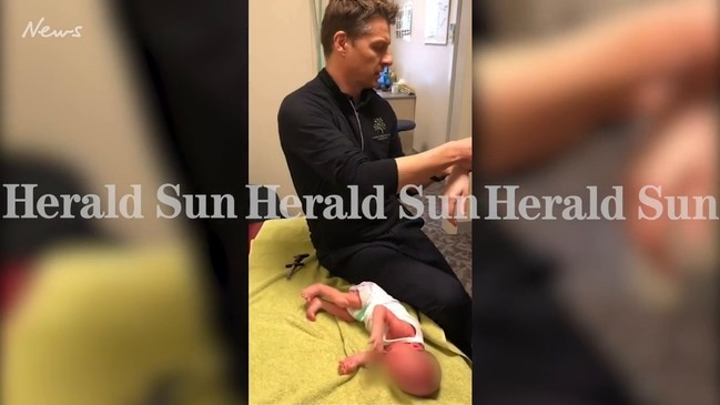 Melbourne chiropractor performs spinal treatment on two-week-old baby