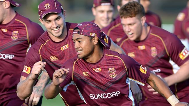Anthony Milford and Corey Oates during Maroons training.