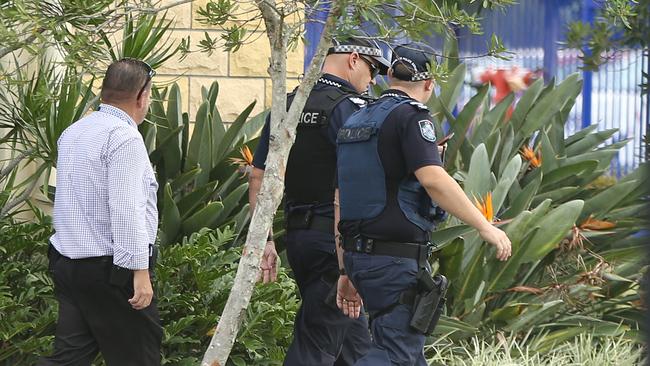 Police at the school after the overdose. Picture Glenn Hampson