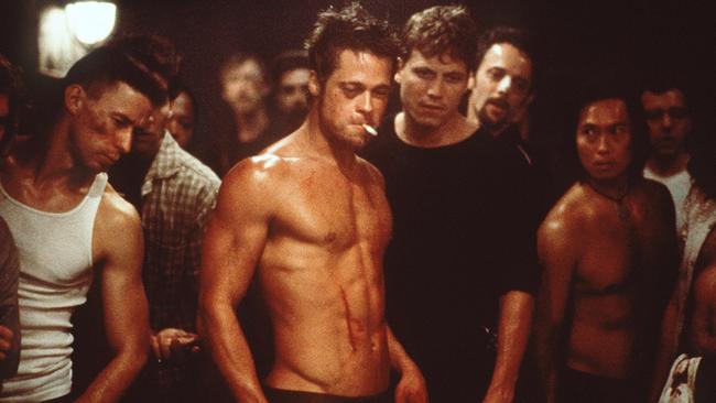 Actor Brad Pitt (cigarette) with Ed (Edward) Norton and others in scene from film ''Fight Club''. /Films/Titles/Fight/Club