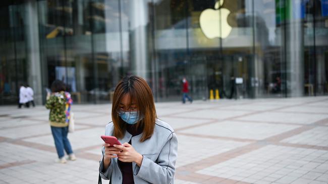 Apple has launched a new version of its cheaper iPhone during the coronavirus pandemic. Picture: WANG ZHAO / AFP