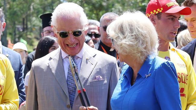 SYDNEY, AUSTRALIA - OCTOBER 22: King Charles III and Queen Camilla cook sausages for the food stalls at the Premier's Community Barbeque at Parramatta Park on October 22, 2024 in Sydney, Australia. The King's visit to Australia is his first as monarch, and the Commonwealth Heads of Government Meeting (CHOGM) in Samoa will be his first as head of the Commonwealth. (Photo by Chris Jackson/Getty Images)