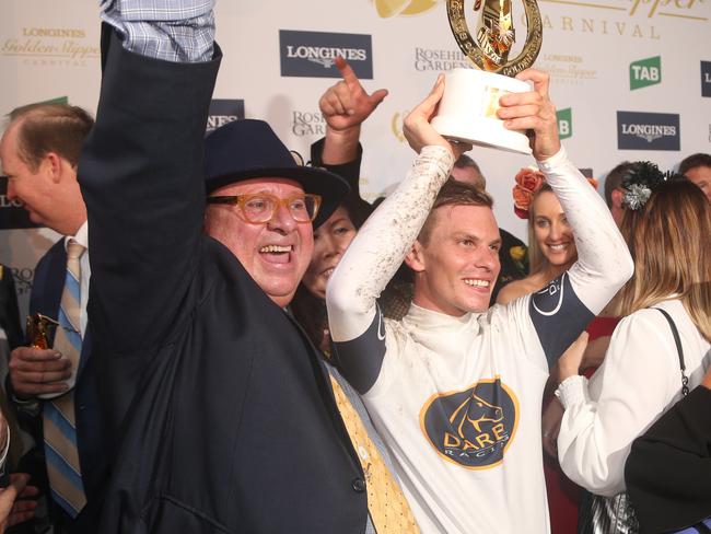 Jockey Ben Melham celebrates winning the Golden Slipper with connections. Picture: Adam Taylor