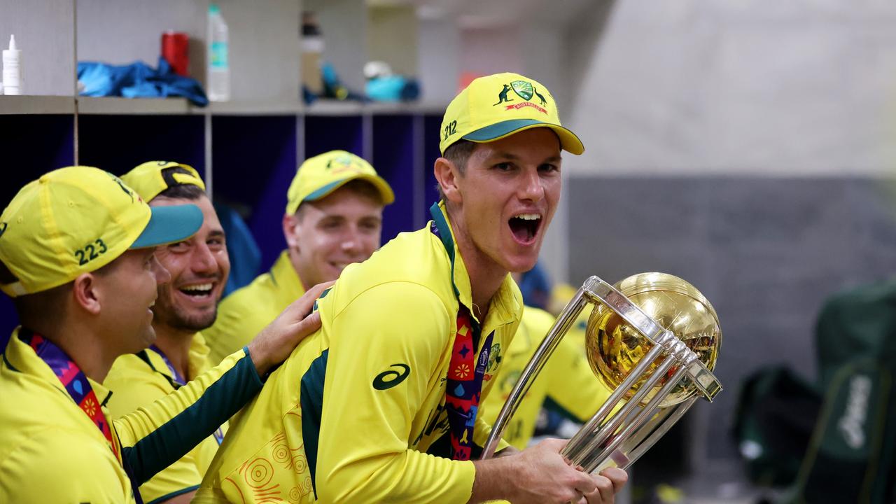 AHMEDABAD, INDIA - NOVEMBER 19: Adam Zampa of Australia poses with the ICC Men's Cricket World Cup Trophy following the ICC Men's Cricket World Cup India 2023 Final between India and Australia at Narendra Modi Stadium on November 19, 2023 in Ahmedabad, India. (Photo by Robert Cianflone/Getty Images)