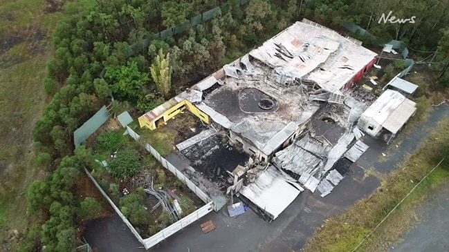 Fire ravaged former Big Brother house from the air | The Courier Mail