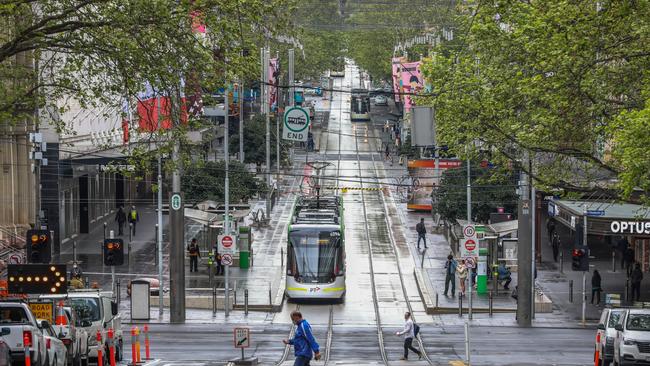 A general view of trams and pedestrians at Bourke Street Mall on September 29, 2021 in Melbourne, Australia. (Photo by Asanka Ratnayake/Getty Images)