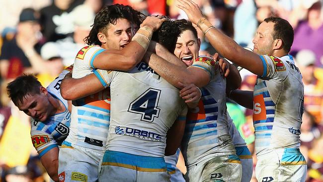 The Titans celebrate a try at Suncorp Stadium. Picture: Jono Searle/Getty Images